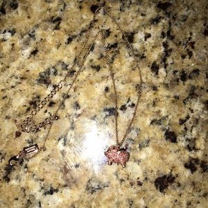 Kate spade flying pig necklace.